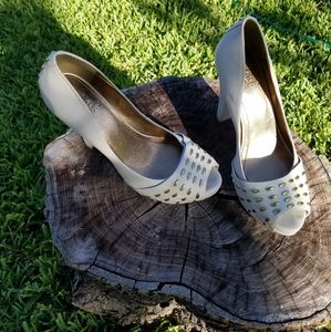 Vince Camuto white heels with gold accents